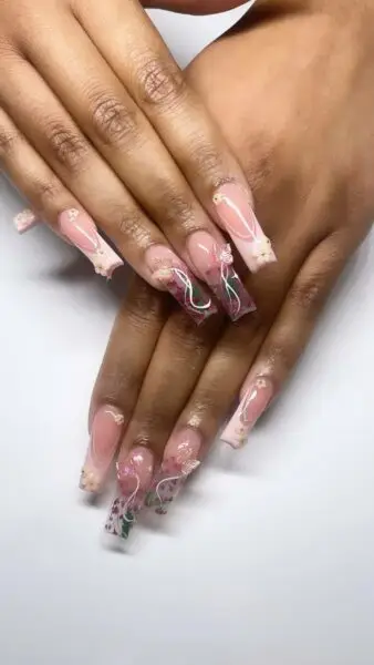 Encapsulated long nails with nail designs at las vegas nail salon by vivian nails