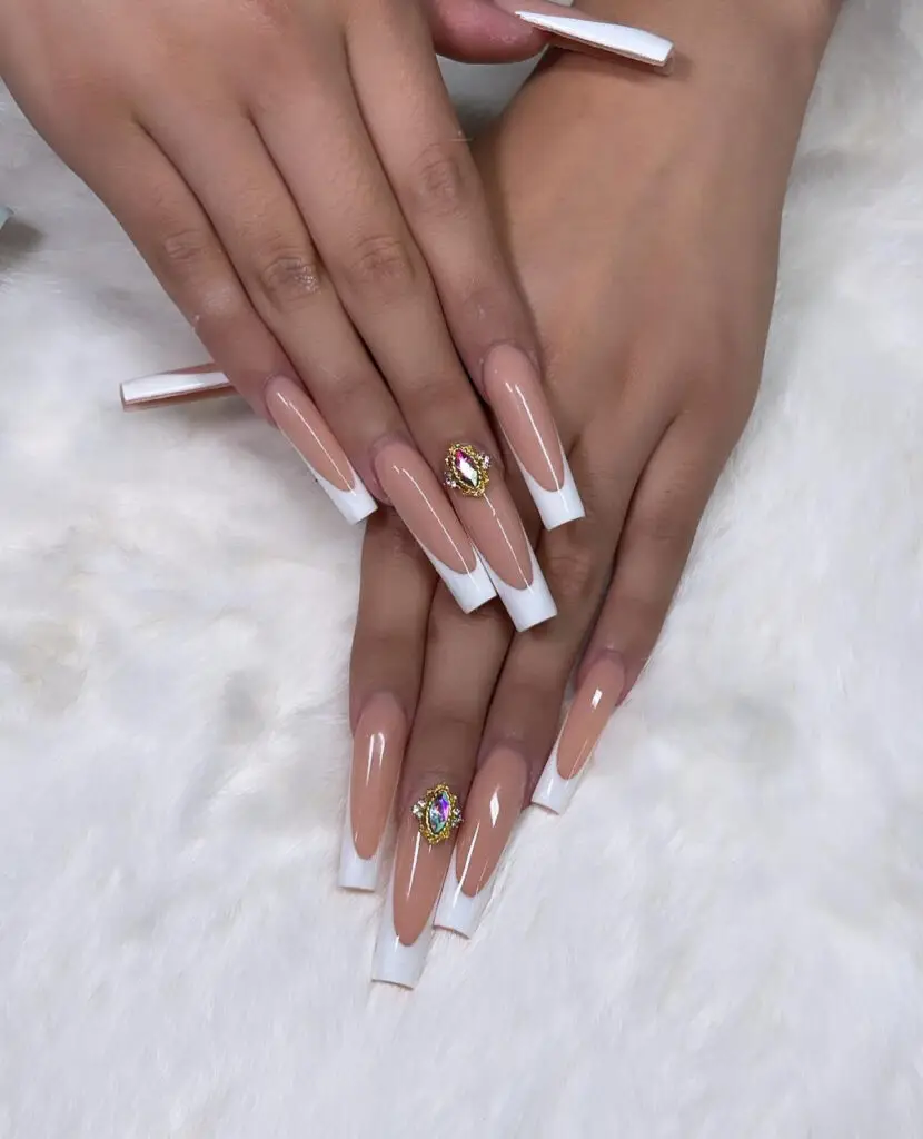 Long nude coffin acrylic full set with white French tips and gem accents at NAB Nail Bar, Las Vegas