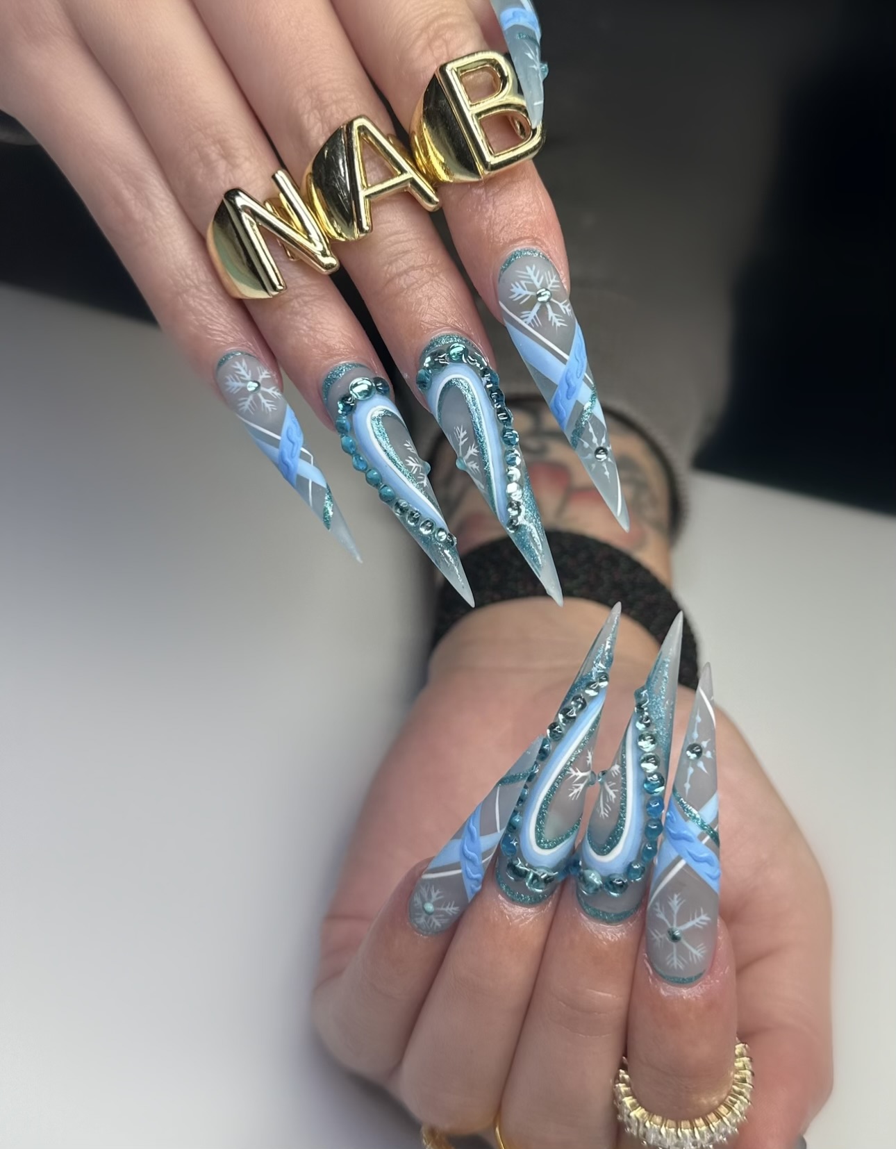 Beautiful Gel X nails with intricate nail art designs at NAB Nail Bar in Las Vegas