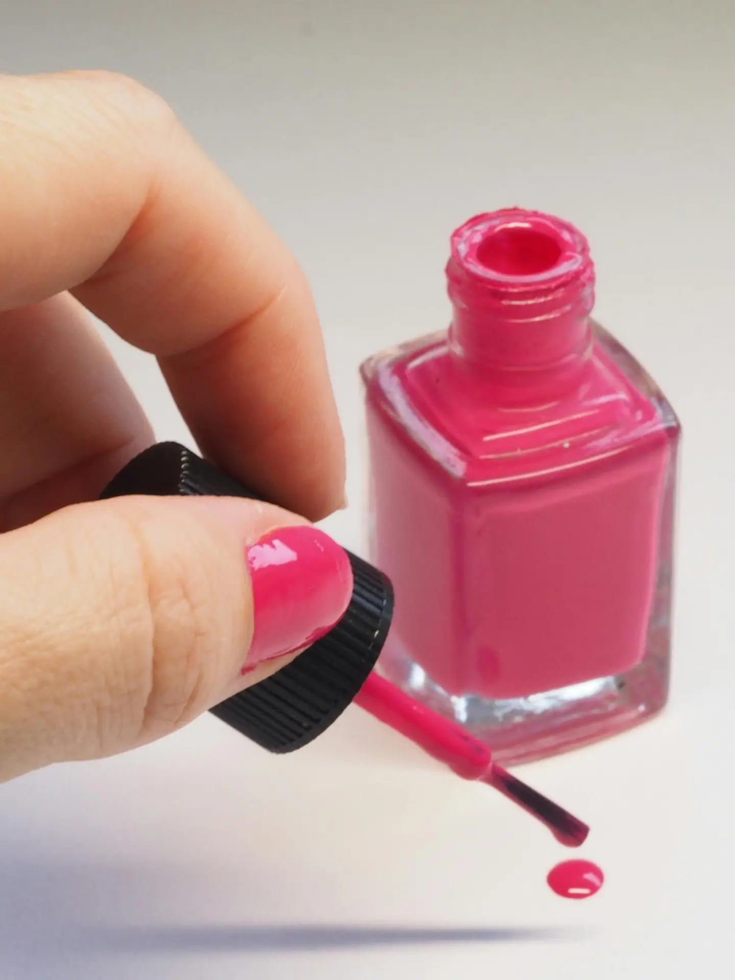 Close-up of a nail polish bottle used for French tip nails in Las Vegas, showcasing a classic shade for a flawless manicure finish