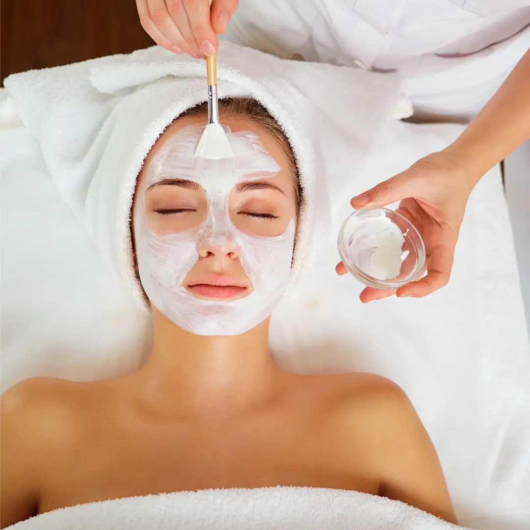 Relaxing facial treatment with skilled technician using advanced skincare techniques at NAB Nail Bar in Las Vegas.