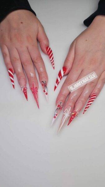 Long Stiletto Nails by Jimmy with bows and red and white designs