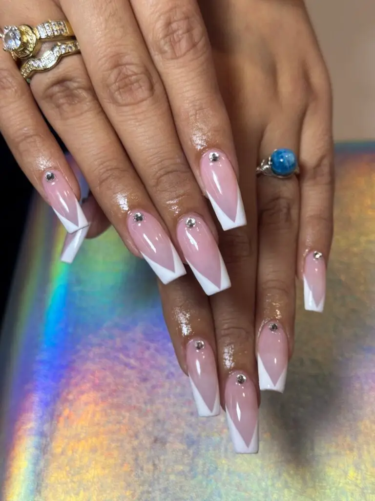 Jocelynn's Gel X French Tip nails with a clean and elegant design and a hard gel fill showcasing durability and style at NAB Nail Bar in Las Vegas