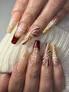 Red and gold christmas gel x nails in las vegas nab nail bar | nails lashes and beauty in las vegas