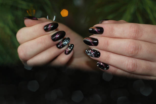 Stunning cat eye nails with unique designs, perfect for New Year's Eve celebrations and nail ideas.