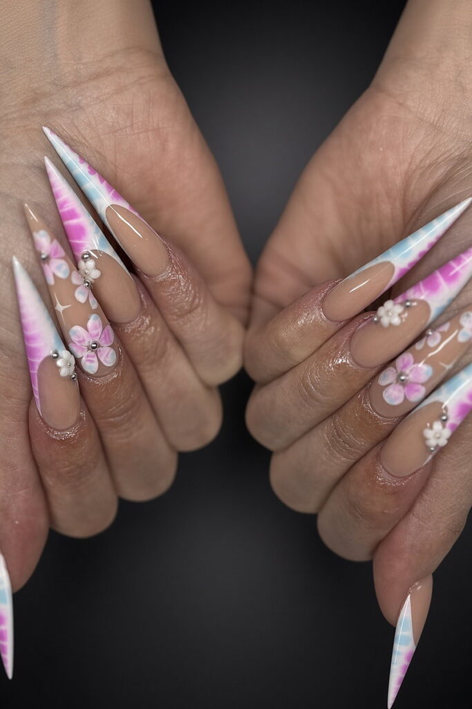 Long stiletto acrylic full set with pastel pink tie-dye tips and white 3D flowers at NAB Nail Bar, Las Vegas