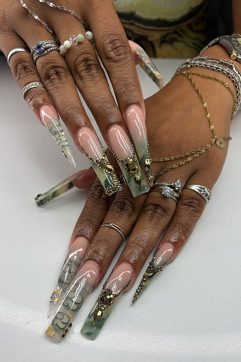 Extra-long encapsulated acrylic nails with money-print and jade marble designs and gold rhinestones, done at NAB Nail Bar in Las Vegas