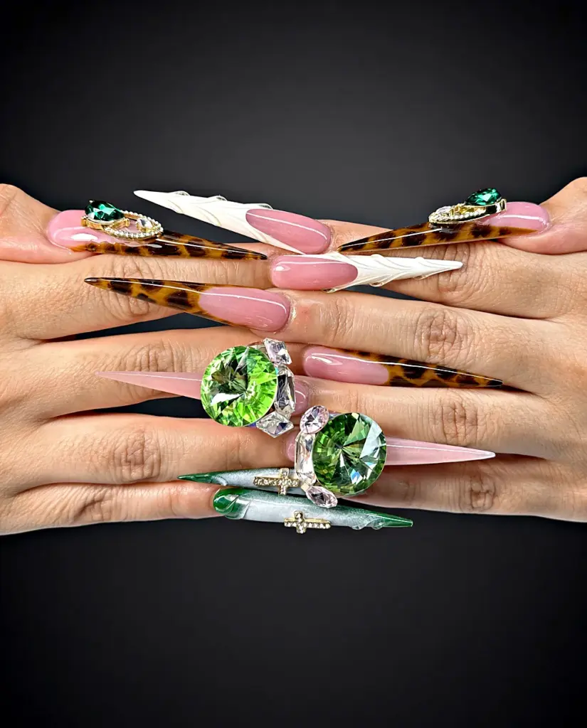 2.5 inch sculpted stiletto Gel X nails with tortoiseshell, white sculpting and oversized green gems, custom made with NABulous tips at NAB Nail Bar in Las Vegas
