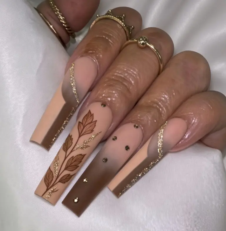 Long coffin acrylic full set with brown ombre, hand-painted autumn leaves and gold glitter at NAB Nail Bar, Las Vegas