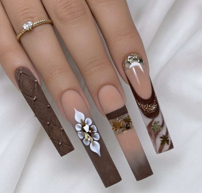 Long brown fall acrylic full set with quilted texture, 3D white flower and gold leaf accents at NAB Nail Bar, Las Vegas