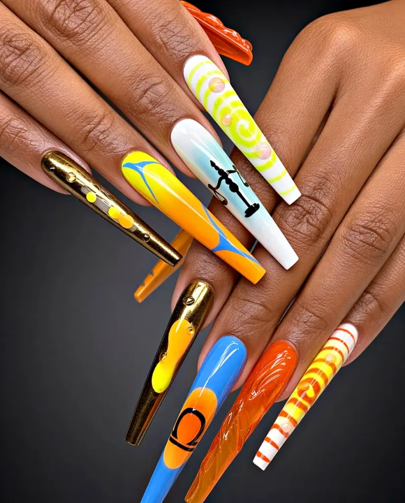 Extra long coffin Gel X nails in orange, blue and neon yellow with gold chrome and a Libra symbol at NAB Nail Bar in Las Vegas