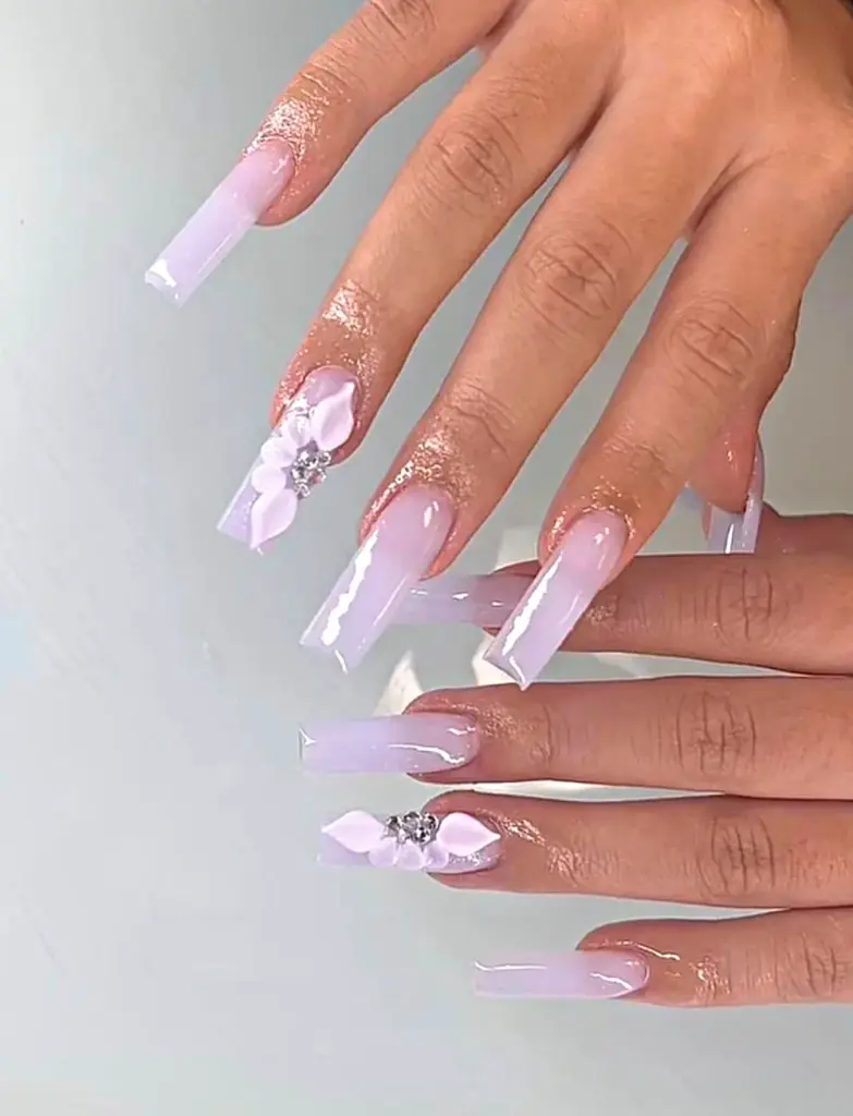 Extra long square Gel X nails in lilac with a 3D flower and crystals at NAB Nail Bar in Las Vegas