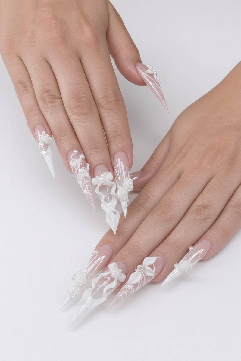 Bridal Nails Las Vegas White 3d Floral Stiletto Gel X Set Nab Nail Bar Long white stiletto bridal nails with sculpted 3d flowers bows and ribbon detail on soft gel tips nab nail bar