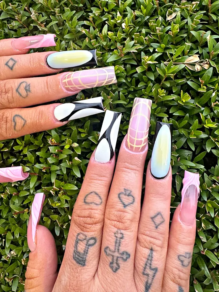 Long square Gel X nails with abstract pastel aura, black and white lines and a pink 3D tip at NAB Nail Bar in Las Vegas