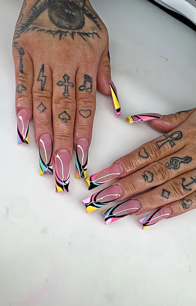 Long square Gel X nails with a pastel and black swirl French tip at NAB Nail Bar in Las Vegas
