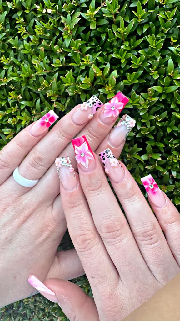 Medium square Gel X nails with pink French tips, hand-painted flowers, leopard print and crystals at NAB Nail Bar in Las Vegas