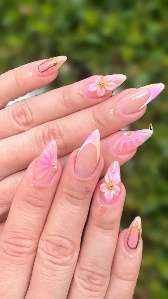 Short stiletto Gel X nails in pink and peach aura with 3D flowers, pearls and gold wire at NAB Nail Bar in Las Vegas